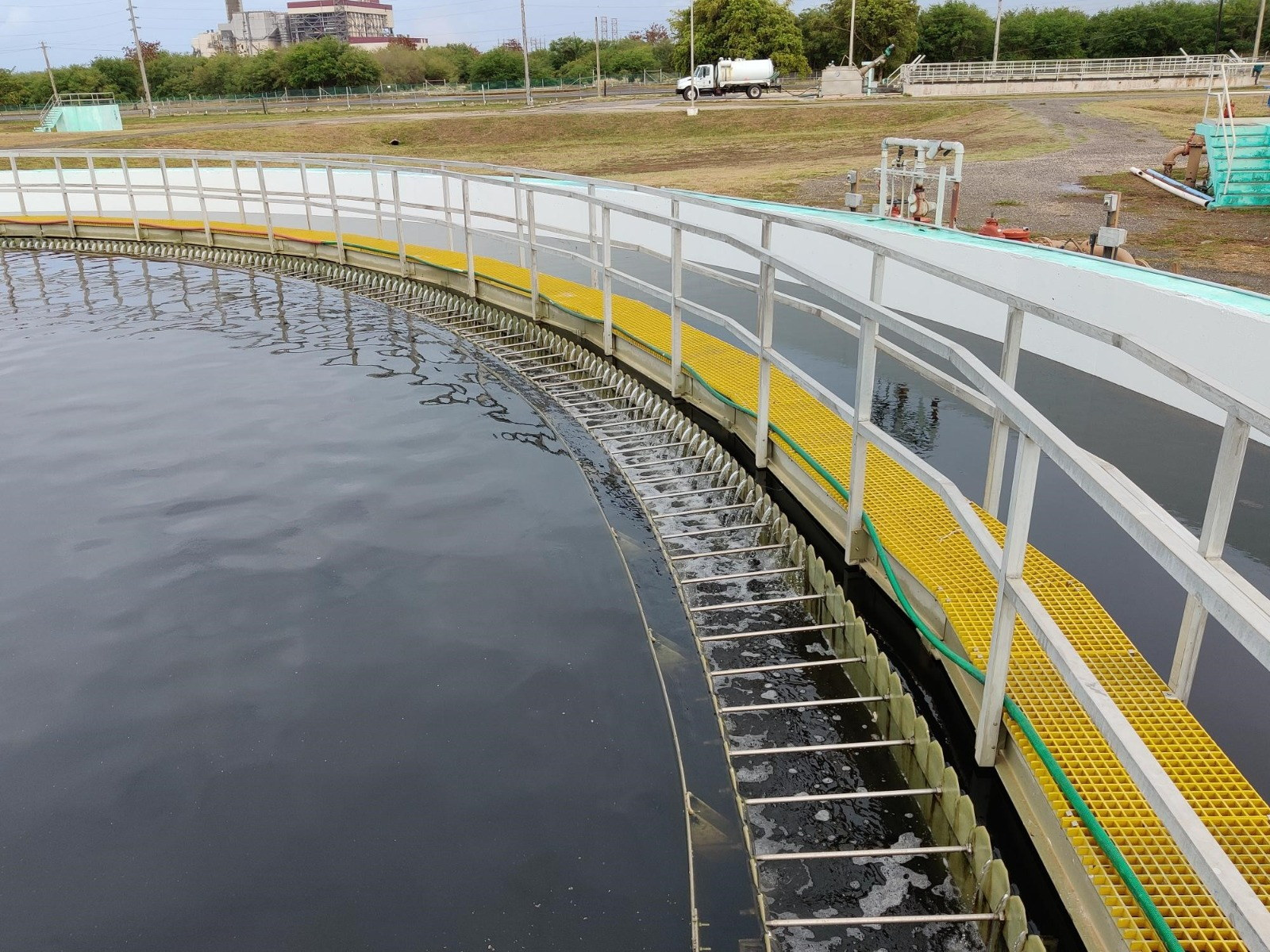 FRP thickener trough, launder weirs and FRP grating walkway in service in Puerto Rico